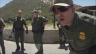 Border Patrol officer smashes drivers window with his arm after driver remains silent.